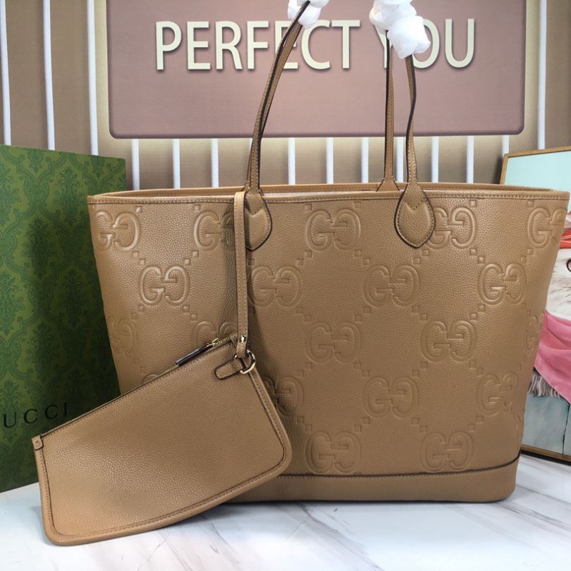 G*u*i shopping bags